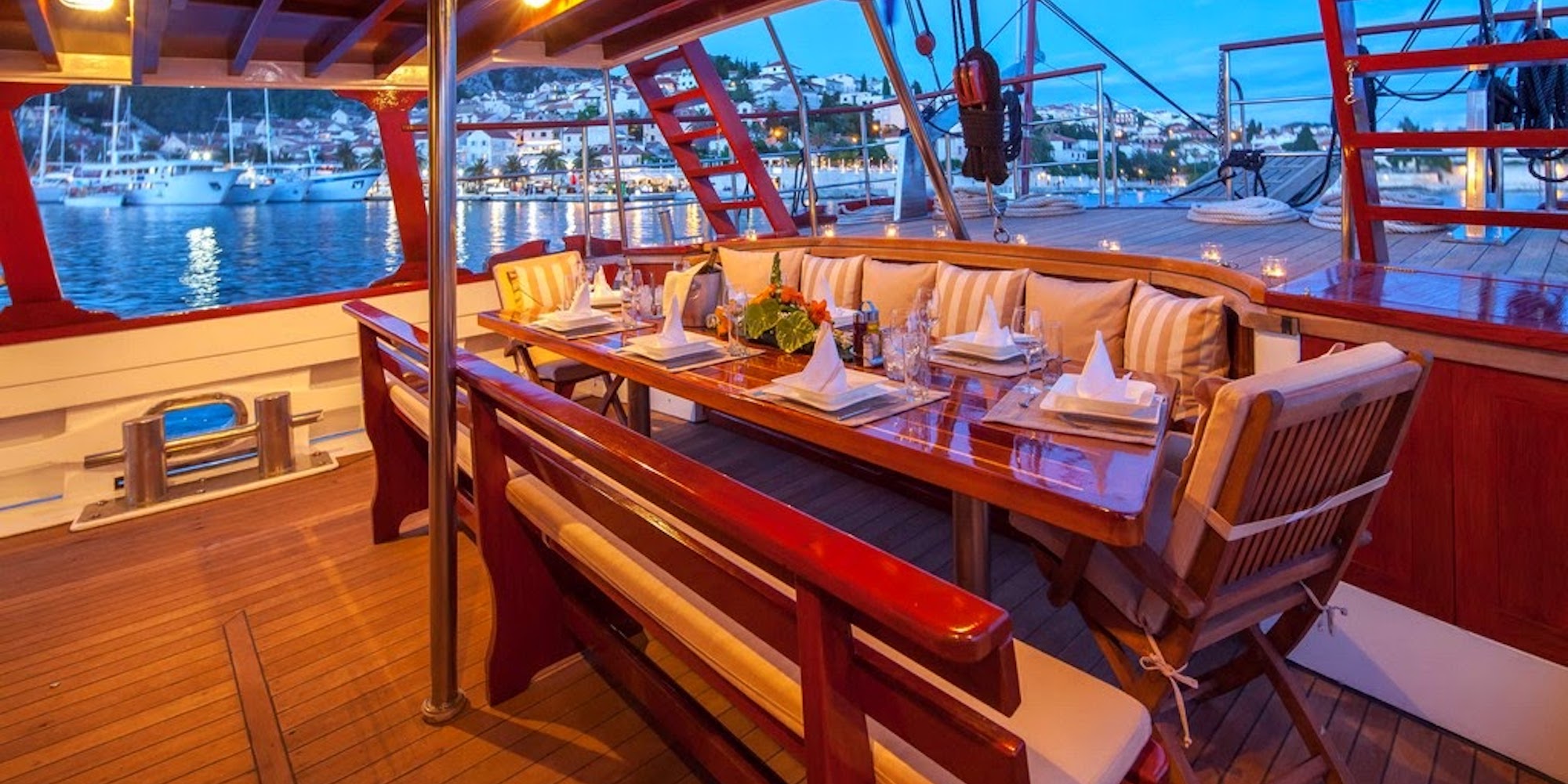 The outdoor dining room aboard the Romanca ship harbored for the evening