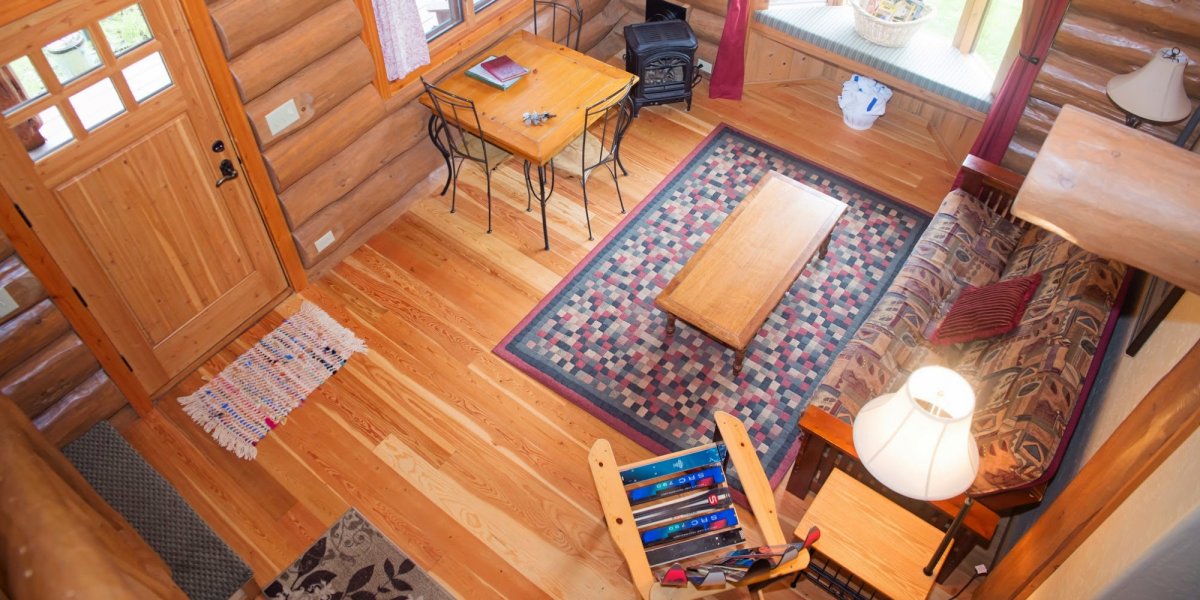 The interior of a log cabin at River Dance Lodge
