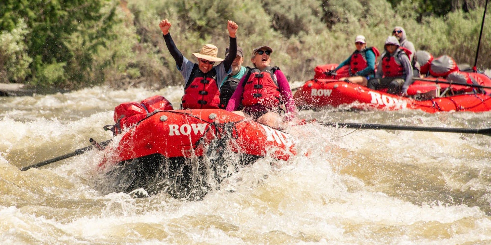 ROW Adventures guests smiling through the rapids of the Bruneau River
