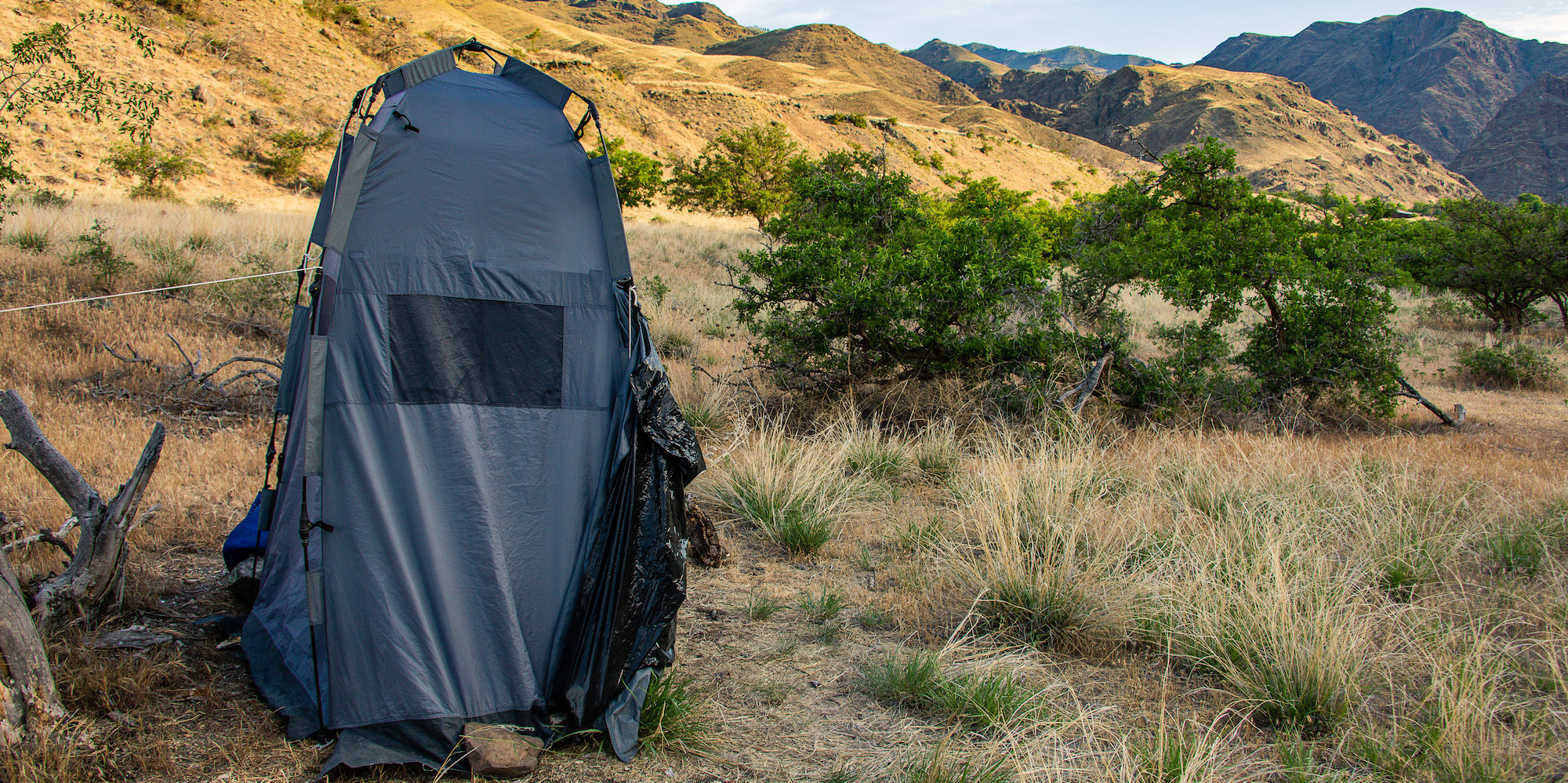 The bathroom tent sent up at camp overlooking the river and Snake River corridor on a ROW Adventures rafting trip