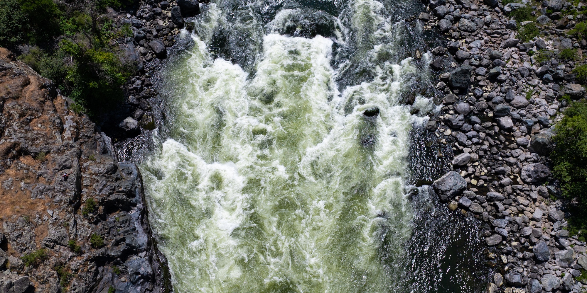 Aerial view of whitewater rapids on the Snake River flowing through Hells Canyon, Idaho