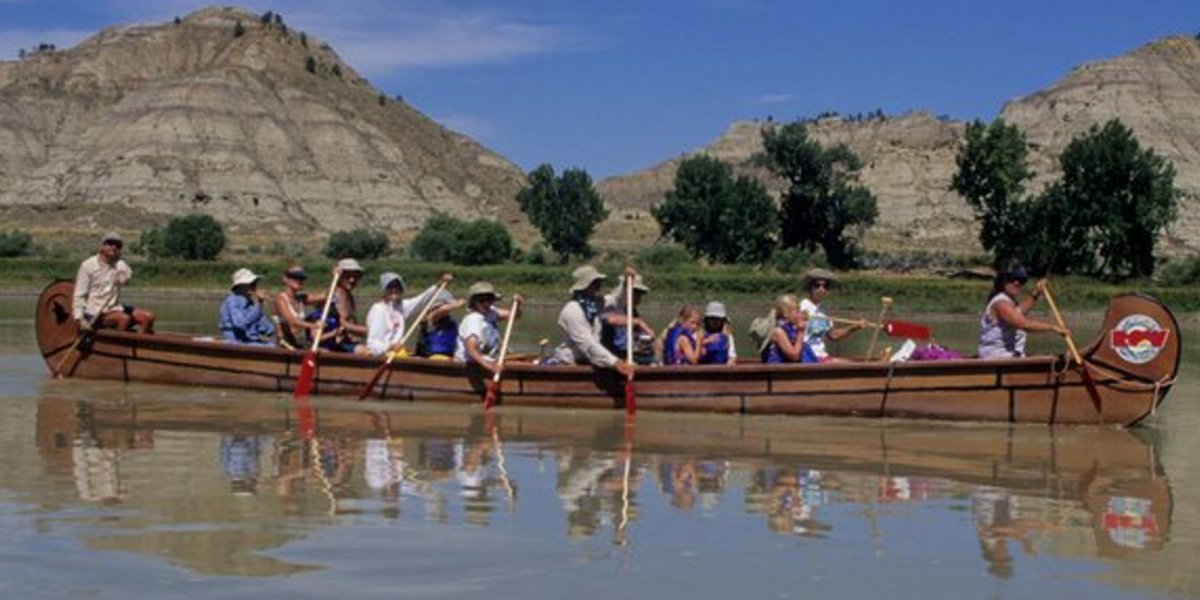 long canoe paddlers