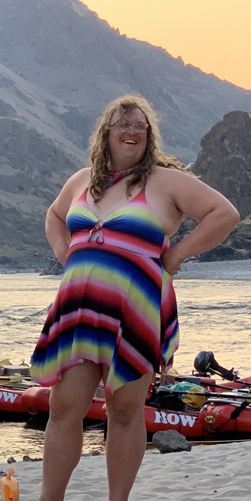 Idaho river guide on a sandy beach while on a multi-day river trip.