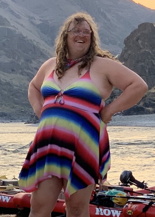 Idaho river guide on a sandy beach while on a multi-day river trip.