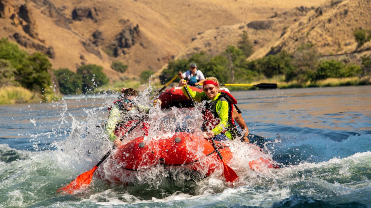 red whitewater raft on the deschutes river in oregon