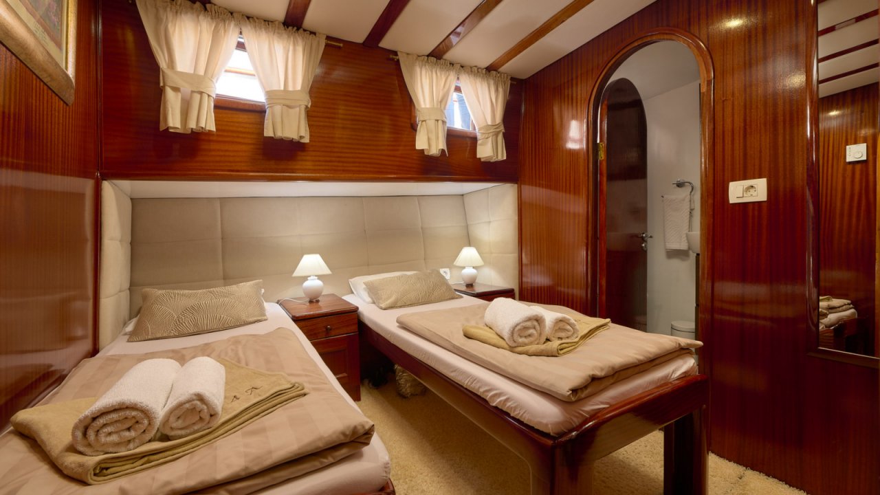two massage tables in small room on ship