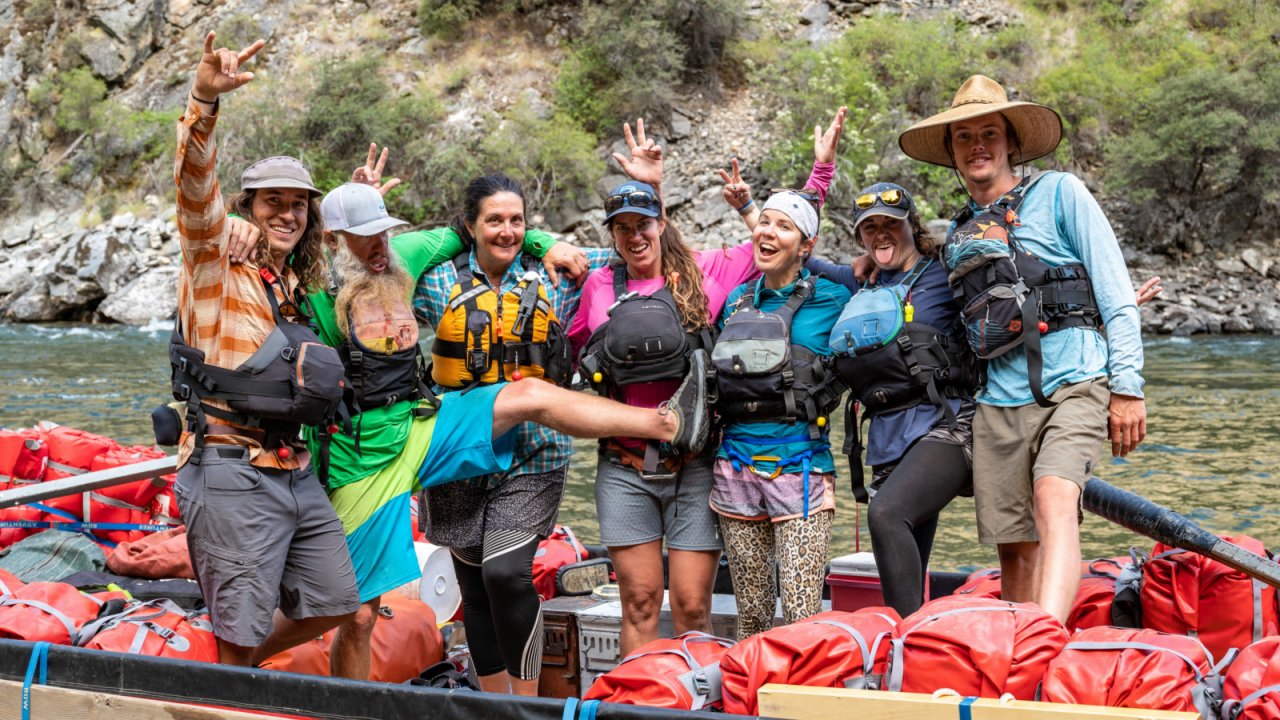 ROW 2021 Middle Fork crew celebrates another successful trip. rafting guides standing in front of cargo raft