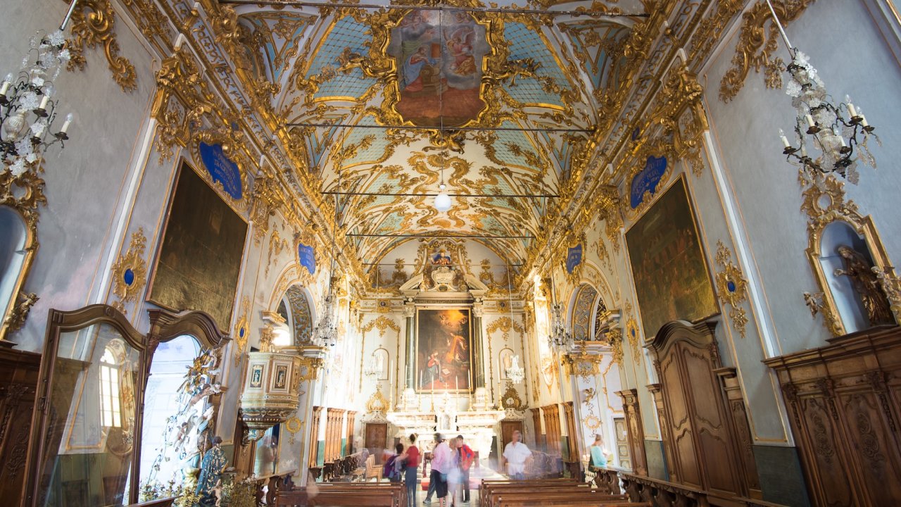 French cathedral with gold and white interior in Corsica.