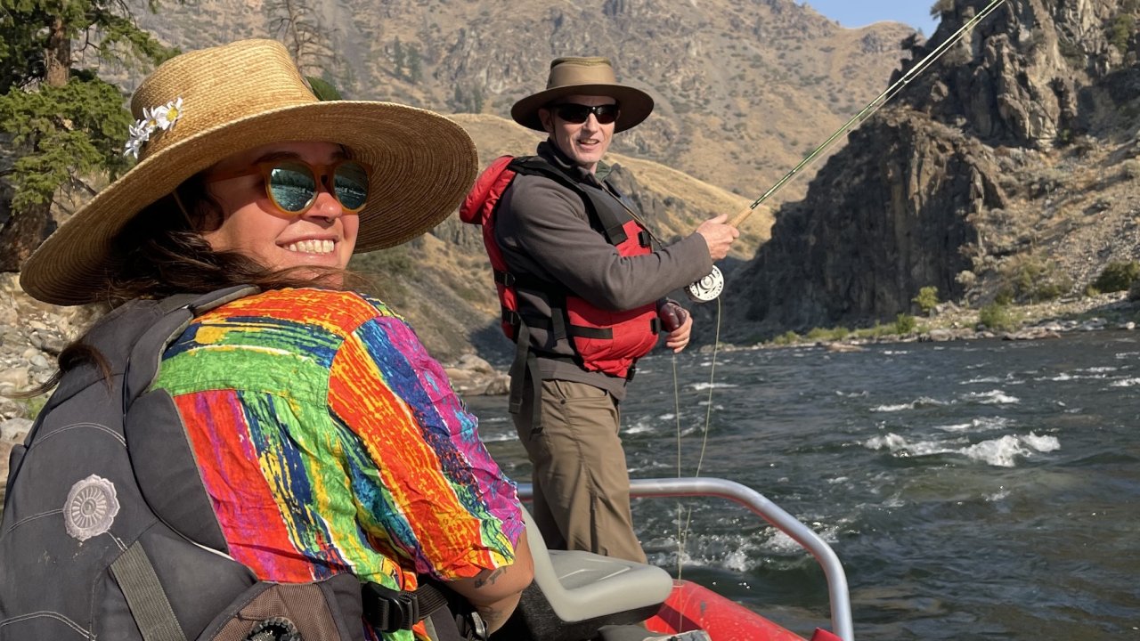 A fly fishing guide rowing a fisherman down the Middle Fork Salmon River as they fly fish
