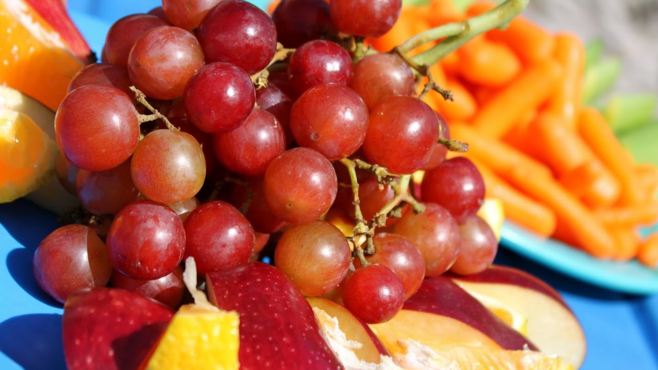 grapes being served as a snack while whitewater rafting