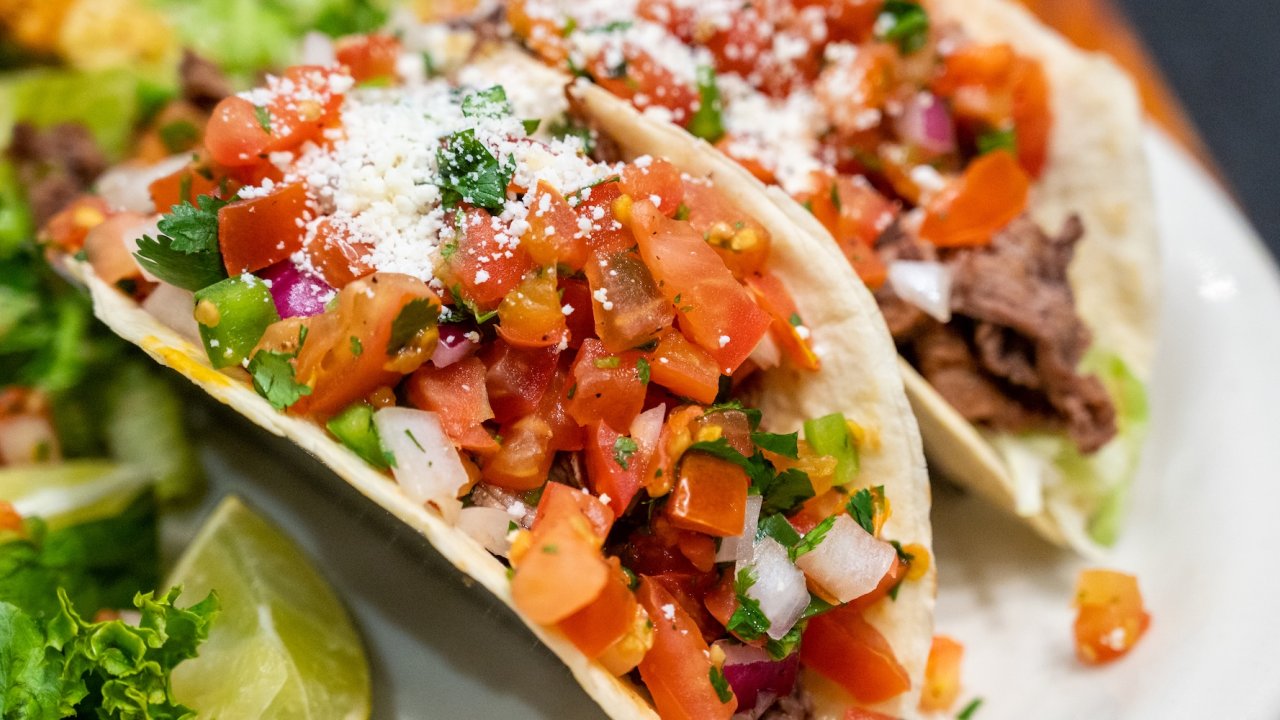 Fresh tacos with pico de gallo, a local favorite meal enjoyed on Idaho biking and adventure tours.