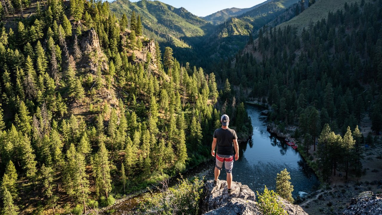 Hiker overlooking the Middle Fork of the Salmon River canyon in Idaho