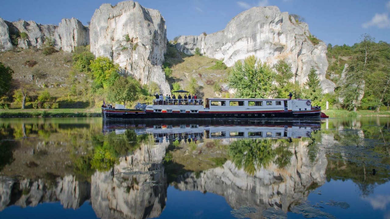 hotel barge sitting in canal