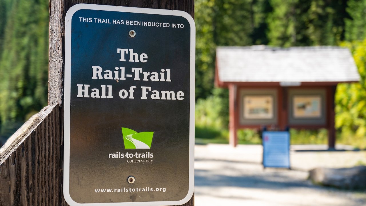 Sign marking the Rail-Trail Hall of Fame at a trailhead