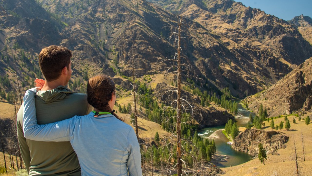 Couple overlooking the River of No Return on the Middle Fork Salmon in Idaho