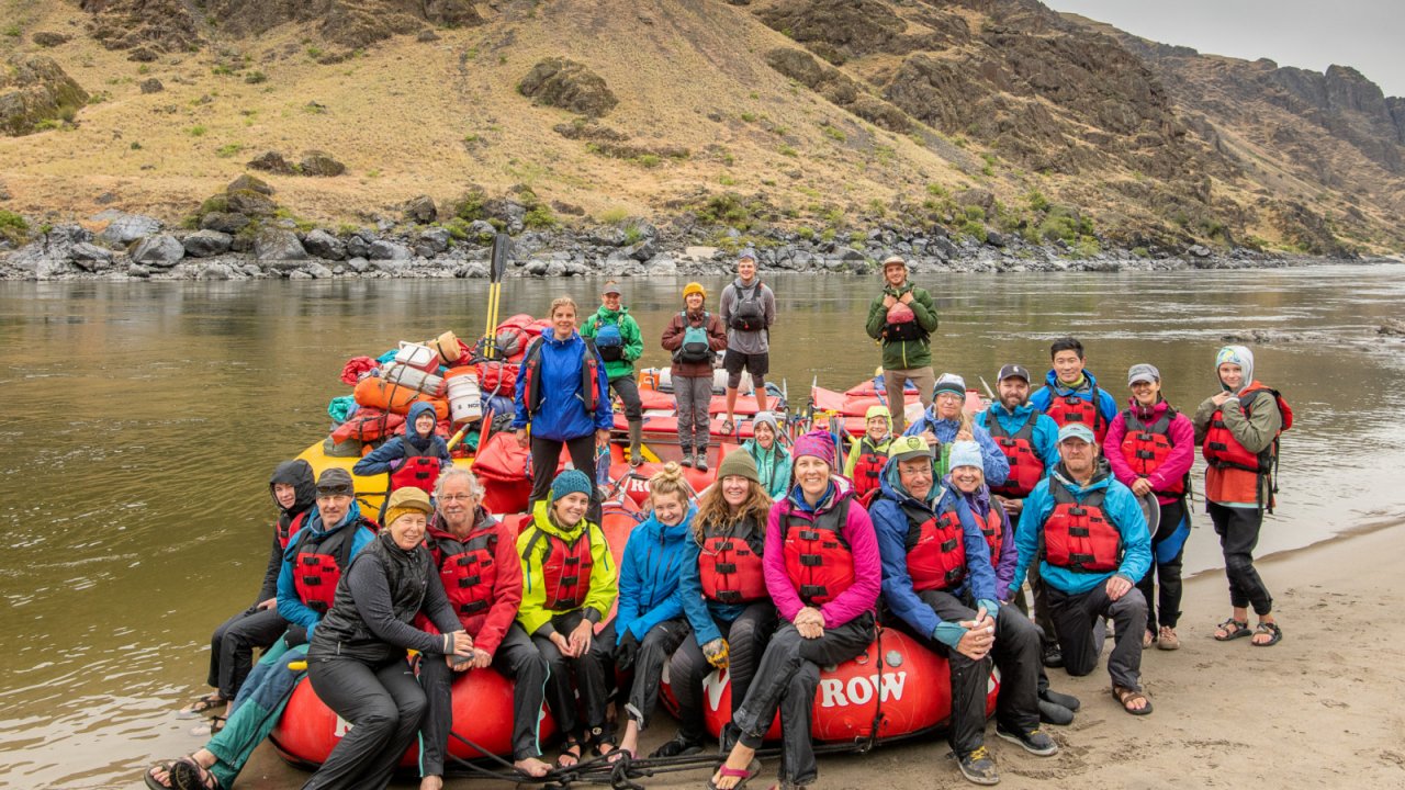 Each season is filled with hundreds of new faces and friends. rafting group on the snake river in idaho