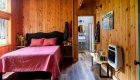 Single bedroom cabin with one queen bed and bathroom 
