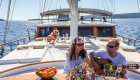 deck on yacht with people dining