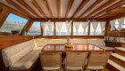 indoor dining table on sailing gulet