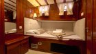 small bed in cabin of a yacht