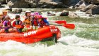Friends and family in a whitewater raft along the Salmon River in Idaho