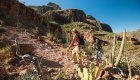 Hikers going up a mountain in the desert of Loreto, Baja California