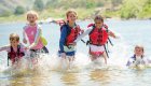 kids playing on the salmon river in idaho