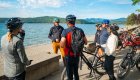Guided biking group gathered by Lake Coeur d'Alene during an Idaho biking tour