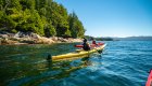 sea kayaking through God's Pocket Provincial Park on a sunny summer day
