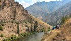 Group of rafters hiking along the scenic Middle Fork Salmon River canyon, a highlight of multi-day Salmon River rafting trips that blend rafting and hiking.