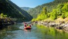 red rafts floating on the rogue river 
