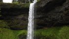 Majestic waterfall in Silver Falls State Park, featured on the Oregon e-bike tour through forested trails