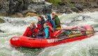 whitewater rafters in red raft