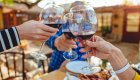 Group toasting with red wine during a winery stop on the Oregon e-bike tour through Willamette Valley wine country