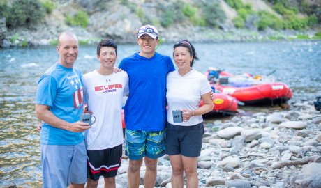 A family of four on a guided rafting trip in Idaho